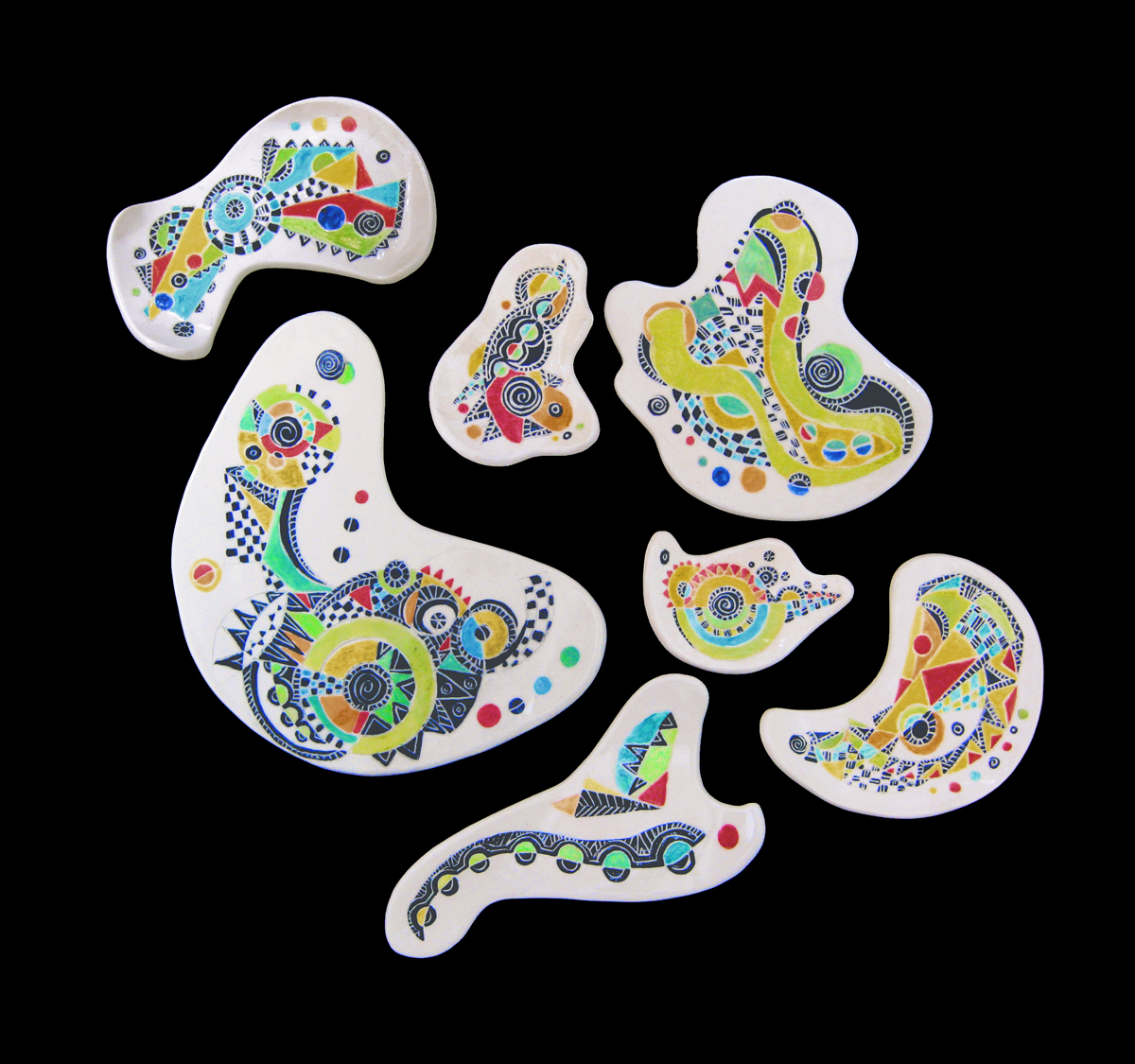 Ceramic shapes with colorful designs 