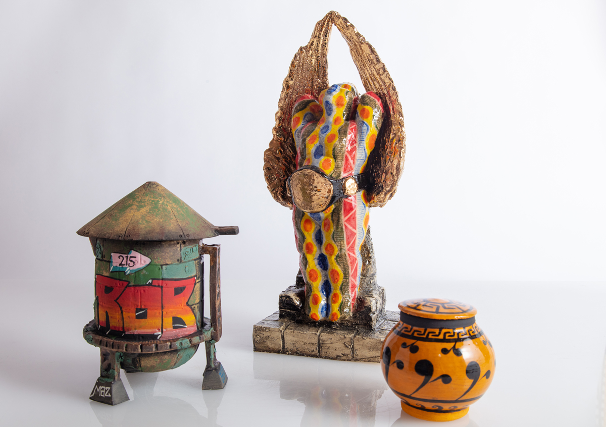 three ceramic art objects by Roberto Lugo